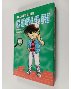 Kirjailijan Gosho Aoyama käytetty kirja Salapoliisi Conan 63