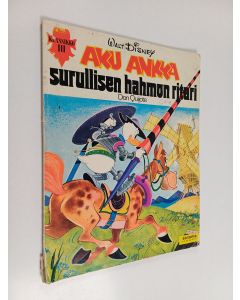 Kirjailijan Walt Disney käytetty kirja Aku Ankka : surullisen hahmon ritari Don Quijote