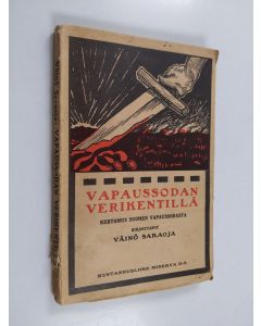 Kirjailijan Väinö Saraoja käytetty kirja Vapaussodan verikentillä : seikkailukertomus Suomen vapaussodasta