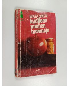 Kirjailijan Agatha Christie käytetty kirja Kuolleen miehen huvimaja