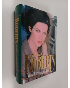 Kirjailijan Nora Roberts käytetty kirja Vaarallinen turvapaikka