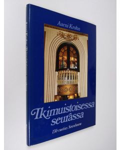Kirjailijan Aarni Krohn käytetty kirja Ikimuistoisessa seurassa : kulttuuria, kulinarismia ja kohtaloita Seurahuoneella, Suomen vanhimmassa hotellissa 1833-1983