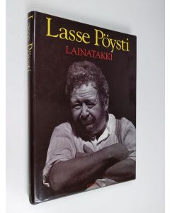 Kirjailijan Lasse Pöysti käytetty kirja Lainatakki