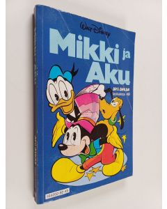 Kirjailijan Walt Disney käytetty kirja Mikki ja Aku