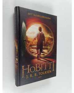 Kirjailijan J. R. R. Tolkien käytetty kirja Hobitti, eli Sinne ja takaisin