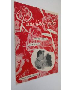 Kirjailijan Louigny käytetty teos Ruusuinen hetki = la vie en rose = i rosenrött jag drömmer : tango