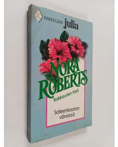 Kirjailijan Nora Roberts käytetty kirja Sateenkaaren väreissä