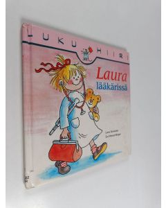 Kirjailijan Liane Schneider käytetty kirja Laura lääkärissä