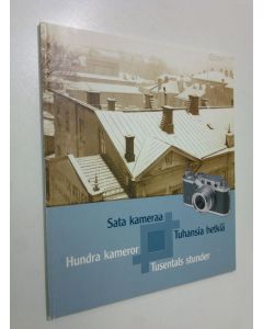 käytetty kirja Sata kameraa - tuhansia hetkiä