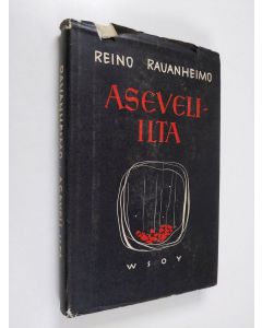 Kirjailijan Reino Rauanheimo käytetty kirja Aseveli-ilta : romaani