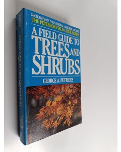 Kirjailijan George A. Petrides käytetty kirja A field guide to trees and shrubs : field marks of all trees, shrubs, and woody vines that grow wild in the northeastern and north-central United States and in southeastern and south-central Canada