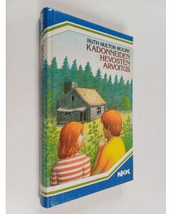 Kirjailijan Ruth Nulton Moore käytetty kirja Kadonneiden hevosten arvoitus