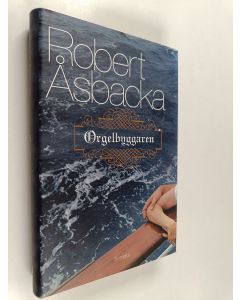 Kirjailijan Robert Åsbacka käytetty kirja Orgelbyggaren : roman