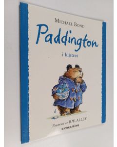 Kirjailijan Michael Bond käytetty kirja Paddington i klistret