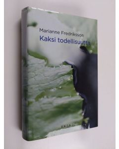 Kirjailijan Marianne Fredriksson käytetty kirja Kaksi todellisuutta