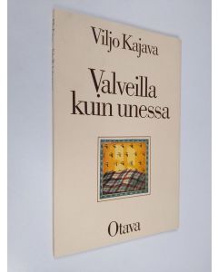 Kirjailijan Viljo Kajava käytetty kirja Valveilla kuin unessa : runoja