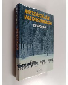 Kirjailijan E. E. Tuompo käytetty kirja Metsästäjän valtakunnassa : erämiehen huomioita ja muistelmia suurilta saloiltamme