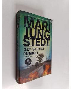 Kirjailijan Mari Jungstedt käytetty kirja Det slutna rummet