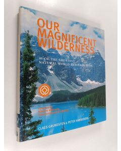 Kirjailijan Claes Grundsten käytetty kirja Our magnificent wilderness : 40 of the greatest natural world heritage sites