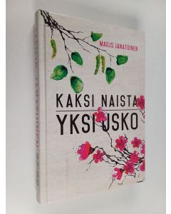 Kirjailijan Mailis Janatuinen käytetty kirja Kaksi naista, yksi usko : Laura Suomisen ja Chieko Ishiin elämäkerta