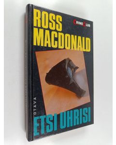 Kirjailijan Ross Macdonald käytetty kirja Etsi uhrisi
