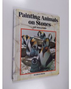 Kirjailijan Lin Wellford käytetty kirja Painting Animals on Stones