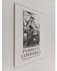 Kirjailijan Urho Antikainen käytetty kirja Pyhitetty lepopaikka : Kuopin hautausmaiden historia