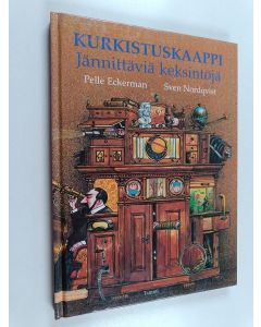 Kirjailijan Pelle Eckerman käytetty kirja Kurkistuskaappi : jännittäviä keksintöjä
