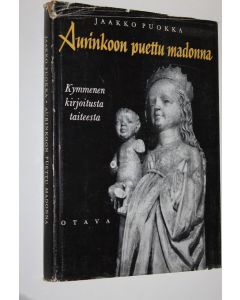 Kirjailijan Jaakko Puokka käytetty kirja Aurinkoon puettu madonna : kymmenen kirjoitusta taiteesta