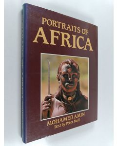 Kirjailijan Mohamed Amin käytetty kirja Portraits of Africa