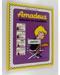 Kirjailijan Charles M. Schulz käytetty kirja Amadeus - elämäni on musiikkia