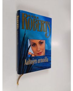 Kirjailijan Nora Roberts käytetty kirja Aaltojen armoilla (ERINOMAINEN)