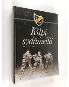 Kirjailijan Jouni Huttunen käytetty kirja Kilpisydämellä : 80 vuotta täyttä tunnetta