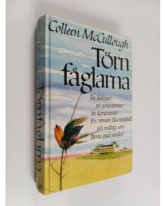 Kirjailijan Colleen McCullough käytetty kirja Törnfåglarna : tre kvinnor, tre generationer, tre kontinenter