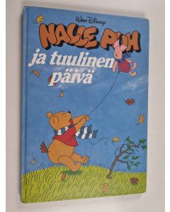 Kirjailijan Walt Disney käytetty kirja Nalle Puh ja tuulinen päivä : Disneyn satulukemisto