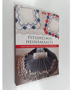 Kirjailijan Rauni Eskola käytetty kirja Pitsihelmiä Heinämaalta