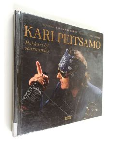 Kirjailijan Ari Lahdenmäki käytetty kirja Kari Peitsamo : rokkari & saarnamies