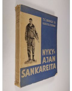 Kirjailijan T. C. Bridges käytetty kirja Nykyajan sankareita : (Heroes of modern adventure)