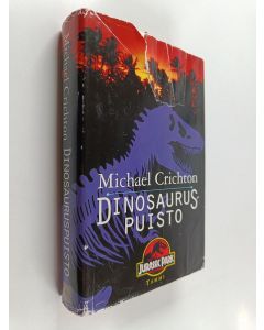 Kirjailijan Michael Crichton käytetty kirja Dinosauruspuisto
