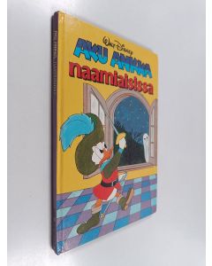 Kirjailijan Walt Disney käytetty kirja Aku Ankka naamiaisissa : Disneyn satulukemisto