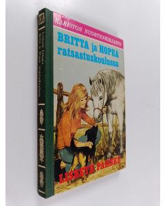 Kirjailijan Lisbeth Pahnke käytetty kirja Britta ja Hopea ratsastuskoulussa