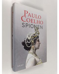Kirjailijan Paulo Coelho käytetty kirja Spionen : roman