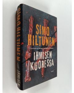Kirjailijan Simo Hiltunen käytetty kirja Ihmisen kuoressa : romaani