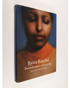 Kirjailijan Björn Ranelid käytetty kirja Tusen kvinnor och en sorg : roman