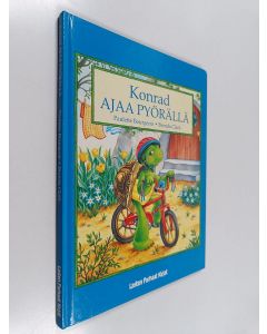 Kirjailijan Brenda Clark & Paulette Bourgeois käytetty kirja Konrad ajaa pyörällä