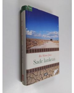 Kirjailijan Ros Wynne-Jones käytetty kirja Sade lankeaa