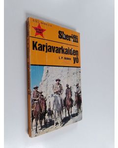Kirjailijan L. P. Holmes käytetty kirja Karjavarkaiden yö