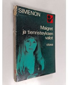 Kirjailijan Georges Simenon käytetty kirja Maigret ja tienristeyksen valot