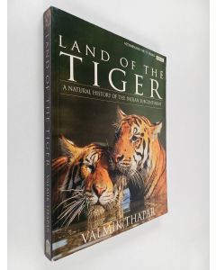 Kirjailijan Valmik Thapar käytetty kirja Land of the tiger : A natural history of the Indian subcontinent