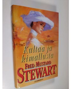 Kirjailijan Fred Mustard Stewart käytetty kirja Kultaa ja kimallusta